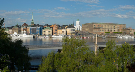 Fototapeta premium View over the old town Gamla Stan, the island Blasieholmen and the bay Strömmen from the canon battery park Batteriparken on the island Skeppsholmen in Stockholm