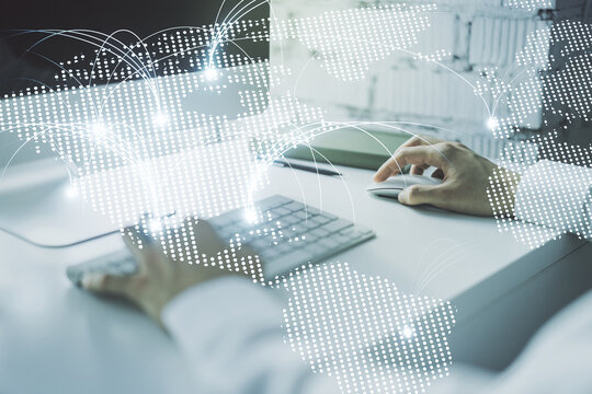 Double exposure of abstract digital world map with connections and hands typing on laptop on background, research and strategy concept