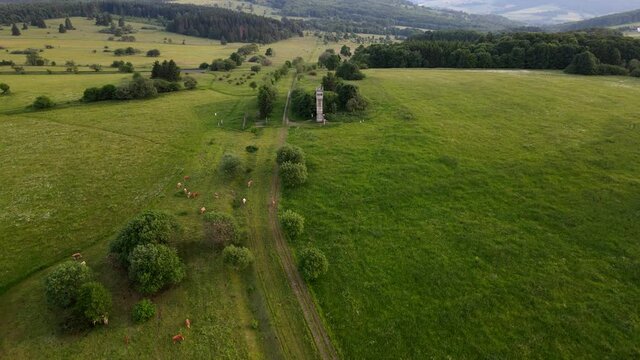 Aerial of the inner german border between GDR and FRG with watchtower, remnants of the cold war and the Berlin wall in 4k, Europe Germany Drone