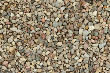 Different sized colorful pebble as background structure