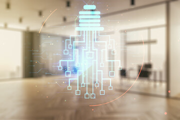 Double exposure of virtual creative light bulb hologram with chip on modern corporate office background, idea and brainstorming concept