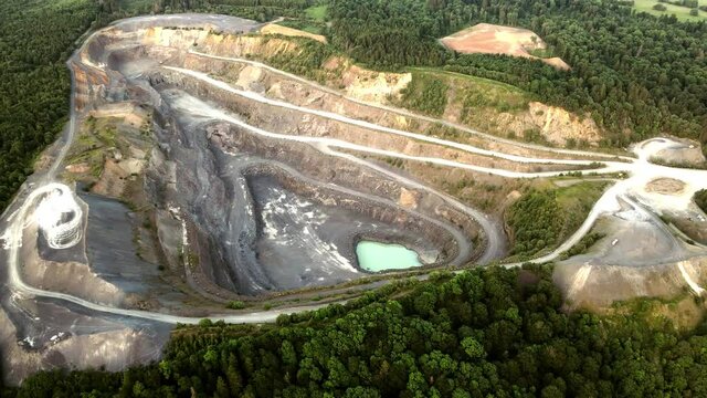 Aerial of a basalt quarry in Germany, drone view of stone pit in 4k