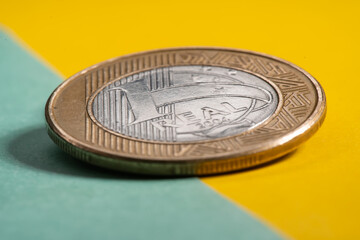 one real  with green and yellow background - Brazilian currency