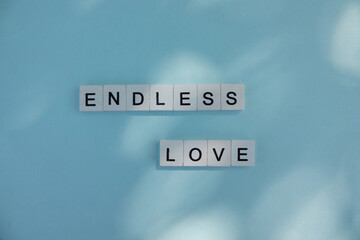 Words Have Power word cube on wood background ,English language learning concept endless love