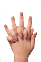 hand with nude manicure on white background