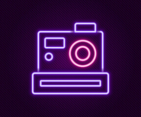 Fototapeta premium Glowing neon line Photo camera icon isolated on black background. Foto camera. Digital photography. Colorful outline concept. Vector
