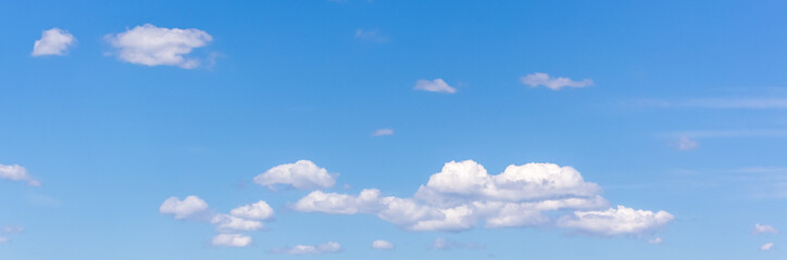 blue clear sky with white clouds wide panorama view