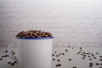 coffee beans in white glass white brick background scene