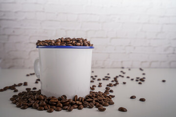 coffee beans in white glass white brick background scene