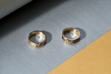 Pair of elegant wedding rings with embossing