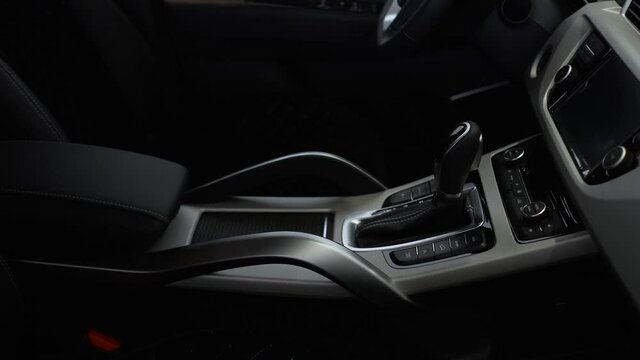 Stick shift transmission in luxury car. 4k resolution shot.