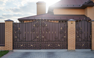 Forged metal gates with ornate lines in a private house