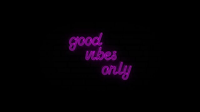 Animation of the words Good Vibes Only in purple flickering neon a black background. 4k - Powered by Adobe