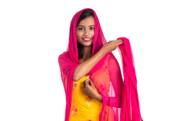 Beautiful Indian traditional girl posing on white background.