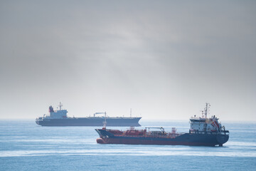 Cargo ships outside of a port