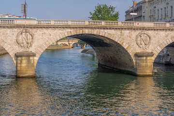 Obraz premium Paris, France - 05 02 2021: Panoramic view of Saint-Michel bridge from quai de Seine