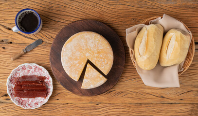 Artisanal Canastra cheese from Minas Gerais, Brazil with bread, coffee and guava sweet