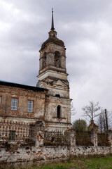 Fototapeta na wymiar stone bell tower of the village church