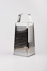 Shiny stainless steel cheese grater
