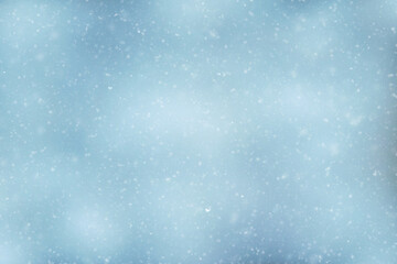 Snowfall texture of snowflakes on blurry background design weather