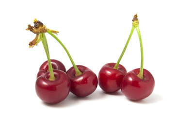Fototapeta na wymiar Ripe red cherries isolated on white background.
