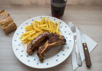 Roasted rib with grilled sausage ​​and french fries