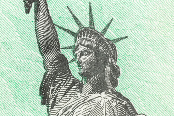 Macro detail of the Statue of Liberty on a United States Treasury check.