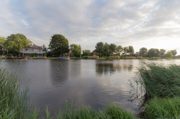Fototapeta na wymiar Rural landscape of the Amstel river at the golden hour