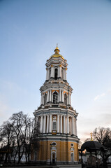 Fototapeta na wymiar The Great Lavra Bell Tower is the main bell tower of the ancient cave monastery of Kyiv Pechersk Lavra in the capital of Ukraine. It is one of the most notable buildings of the Kyiv skyline