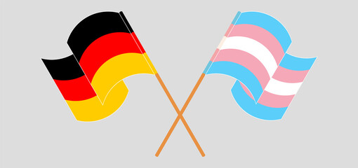 Crossed and waving flags of Germany and Transgender Pride