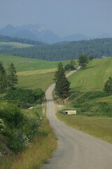 Dirt-truck between hills