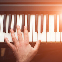 Man playing piano, top view