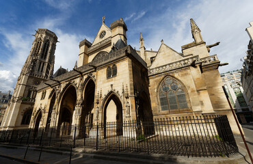 Fototapeta na wymiar The Church of Saint-Germain-l'Auxerrois is a Roman Catholic church in Paris situated at Place du Louvre.