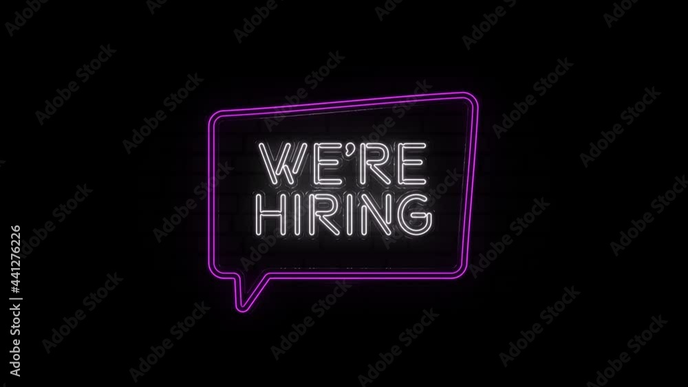 Aufkleber neon text of we're hiring with bubble speech on black background. 4k