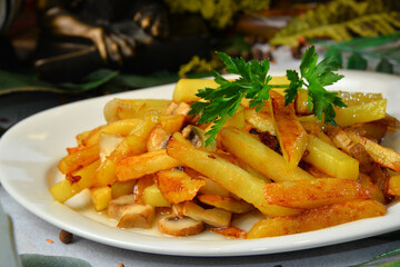 Crisp golden deep fried french fries; hot potatoes on white plate with decorated background - Image