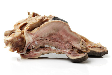 Boiled sheep's head on white background. Muslim tradition