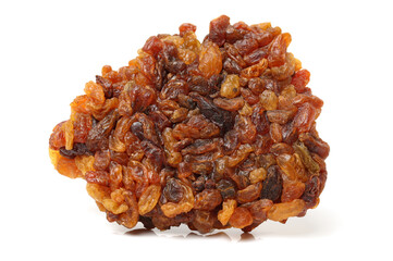 brown raisins on a white background