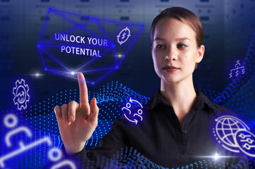 Business, Technology, Internet and network concept. Young businessman working on a virtual screen of the future and sees the inscription: Unlock your potential
