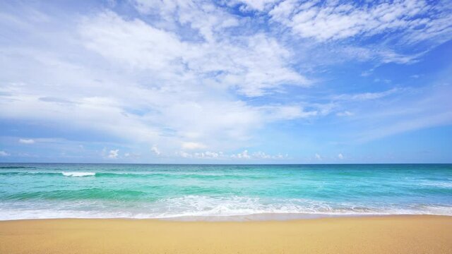 Summer beach Amazing sea clear blue sky and white clouds Wave crashing on sandy shore empty beach at Phuket Thailand, Empty beach sunny day Concept Travel and season tour website background