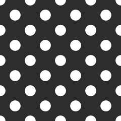 Seamless pattern with black dots on with background.