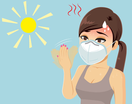 Woman Wearing Medical Face Mask In Summer Sweating With Symptoms Of Heat Stroke