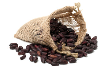 black peanuts on white background
