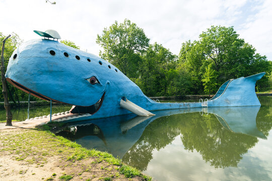 Catoosa, Oklahoma - May 5, 2021: The famous road side attraction Blue Whale of Catoosa along historic Route 66. View of the old ladder from the