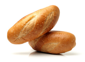 crusty mini baguettes on white surface