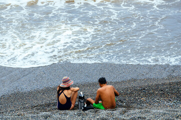 Bathers in the beach enjoying the summer.