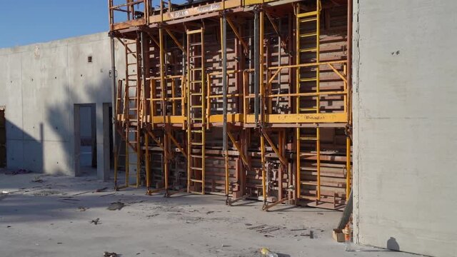 Pan Left, Undergoing construction of a Building and Uses Of Formwork Shuttering Panel 