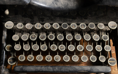 old, neglected and dusty Spanish language typewriter keyboard