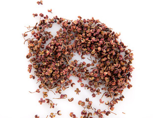 Pepper aniseed scattered on white background