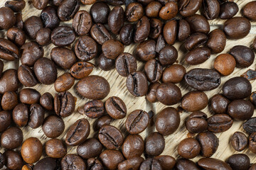 Coffee beans  on wooden background.