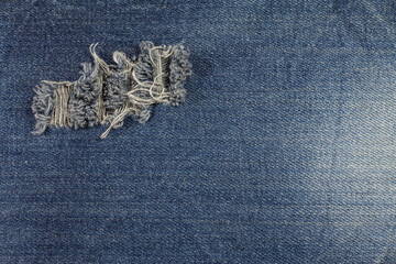 Blue torn denim jeans texture